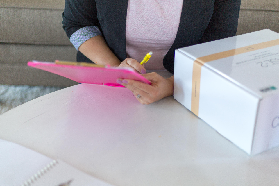 A clipboard and pen